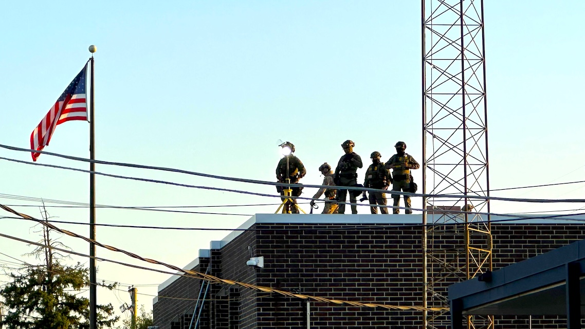 DHS pepperball snipers on the roof of the Broadview Detention Facility, Sept. 2025. [Photo: Michael McDunnah]